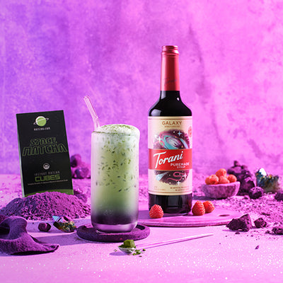 Puremade Galaxy Syrup - Iced matcha with galaxy theme background